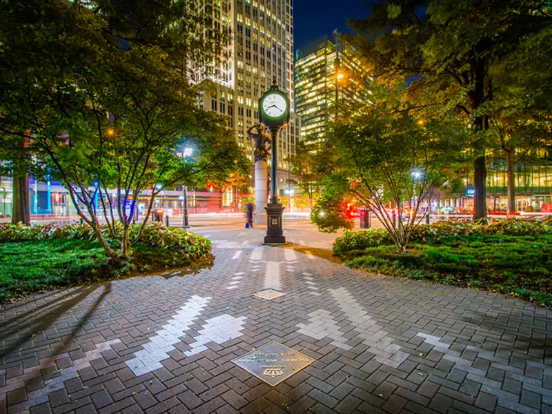 Clock And Modern Buildings In Uptown Charlotte North Carolina