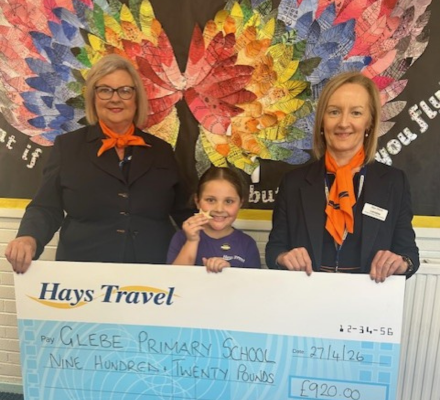 Irvine travel agents complete sponsored run to raise money for local school