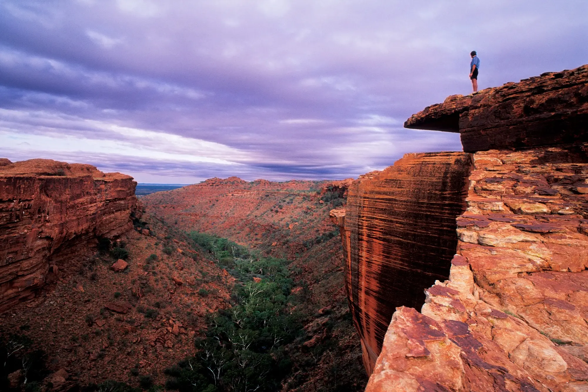 Man standing at the top of Kings Canyon, Northern Territory