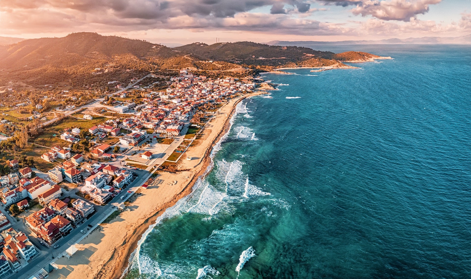 Dramatic panoramic aerial view of iconic Sarti resort town