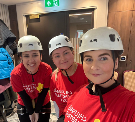Travel agents abseil Belfast hotel to raise money for children’s heart disease charity